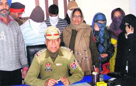 The accused in flesh trade, who were nabbed by the police from an Urban Estate Phase-1-based residential flat, in police custody in Jalandhar on Sunday