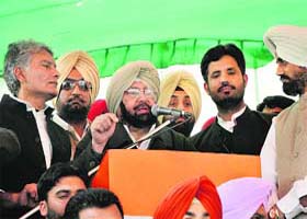 Pradesh Congress chief with CLP Leader Sunil Jakhar (right) and Gidderbaha MLA Raja Warring at the Maghi Mela in Muktsar on Sunday