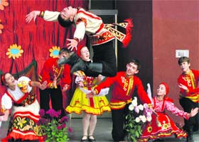 In all their glory: Russian students perform a traditional dance at a private school in Patiala during the student exchange programme on Sunday