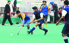 A semifinal match in progress between Uttar Pradesh and Delhi during the National School Games at Sector 42 in Chandigarh on Monday