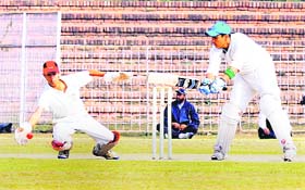 Players in action during a match between Chandigarh and Punjab at the Sector 16 cricket stadium during the National School Games in Chandigarh on Monday