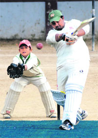 A batsman in action in a match in the Vasudev Singh Raghav Memorial Cricket Tournament in Dehradun on Monday