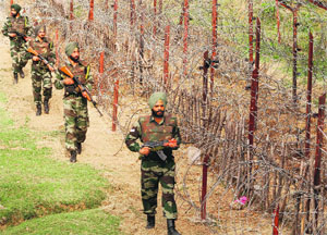 Army jawans guarding the Line of Control in Rajouri sector. Tribune file photo: Anand Sharma