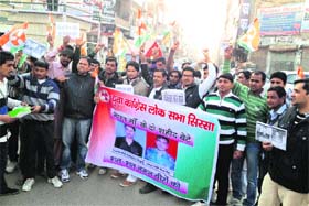 Activists of the Youth Congress hold a demonstration in Sirsa on Friday