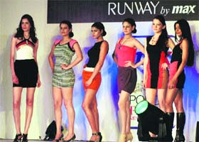 Cat walk: Models walk on the ramp during a function in Gurgaon