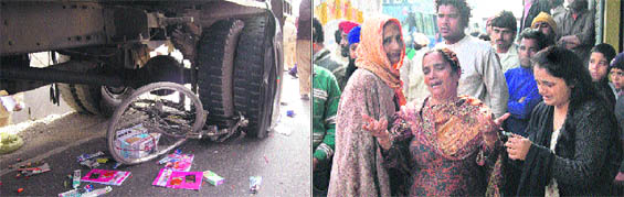 The cycle that was crushed under a truck at Chugitti Chowk in Jalandhar on Monday; and (right) relatives of the victim mourn his death.