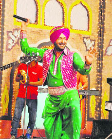 Famous Punjabi singer Malkiat Singh performs in a cultural programme Lohri Shagna Di, organised by Doordarshan Kendra Jalandhar, on Sunday. 