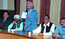 Jagroop Singh Gill of the Congress makes his point at the general house meeting of the Municipal Corporation Bathinda on Tuesday