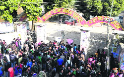 Students lock the gates of the DAV (PG) College in protest aganist a freeze on admission in Dehradun on Tuesday. 