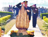 Brig Dig Vijay Setia pays homage to the martyrs at the Bengal Engineer Group and Centre War Memorial, Roorkee, on the 65th Anniversary of the Indian Army on Tuesday. Photo: Navreet Milton 