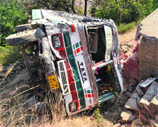 The mangled remains of the bus that fell into a gorge at Darvyash in Mandi on Tuesday. 