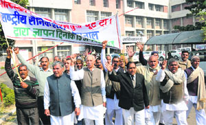 Exservicemen protest against the Pakistan army on the occasion of 'Army Day' in Karnal on Tuesday.
