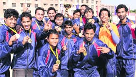 Players of Lovely Professional University in a jubilant mood after winning the Association of Indian Universities North Zone Inter-University Kho-Kho (Men) Championship on the varsity campus near Jalandhar on Tuesday