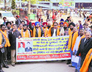 Activists of the Hindu Sikh Jagrati Sena protest against Pakistani artistes, outside the DC office. in Ludhiana.