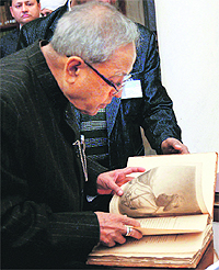 President Pranab Mukherjee having a view of a rare book dating back to the 18th century on Tipu Sultan, while taking a first look of the renovated library at the Rashtrapati Bhavan in New Delhi on Tuesday