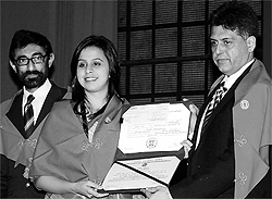Minister of State for I&B Manish Tewari (R) presents PG diploma to a student at the 45th annual convocation of the Indian Institute of Mass Communication in New Delhi on Tuesday