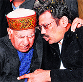 BJP national vice-president Shanta Kumar (left) with new state party chief Kamal Sharma in Chandigarh on Tuesday