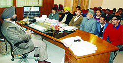 MC Commissioner Bhupinder Singh holds a meeting with the corporation staff in Amritsar on Wednesday