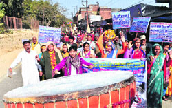 People from Garhwal take a procession from Haridwar to Prayag for the Mahakumbh on Wednesday. Tribune photo: Rameshwar Gaur