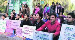 Volunteers of various women organisations hold a protest against atrocities on women at Gandhi Park in Dehradun on Wednesday. Tribune photo: Vinod Pundir