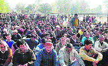 Striking ministerial employees hold a protest in support of their demands at Parade Ground in Dehradun on Wednesday