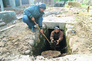 Poonch residents clean their bunkers in view of tension on the Line of Control. 