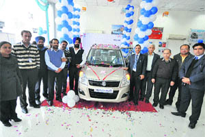 Officials of the Peaks Automobiles at the launch of the new model of Wagon R, in Kunjawani area of Jammu. 