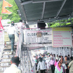 Devotees come out after paying obeisance at the Vaishno Devi cave shrine on Wednesday.