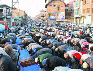 People offer special prayers (Khuj Degar) at the shrine of Sufi saint Naqashband Sahib in Srinagar on Wednesday. 