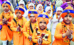 A religious procession being taken out on the eve of the birth anniversary of Guru Gobind Singh at the parikarma of the Golden Temple in Amritsar on Thursday