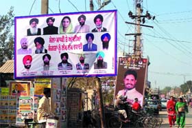 Hoardings put up by political parties to greet residents on the Maghi Mela are yet to be removed in Muktsar
