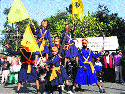 Nihang Sikhs participate in a nagar kirtan taken out on the birth anniversary of Guru Gobind Singh in Dehradun