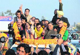 Newly appointed state BJP president Kamal Sharma being given a rousing welcome by party leaders in Jalandhar on Thursday