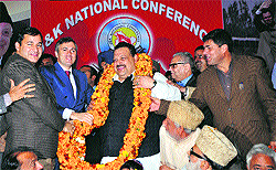 Chief Minister Omar Abdullah felicitates new provincial president of the National Conference Devender Singh Rana in Jammu on Thursday