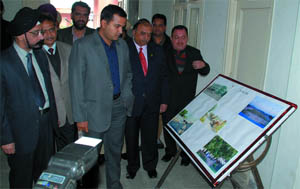 DC Kamal Kishore Yadav having a look at a participants creation at a photo exhibition organised at the Teachers Home in Bathinda on Friday. 