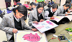 Children take part in a painting competition on oil gas conservation at The British School in Sector 44, Chandigarh, on Friday