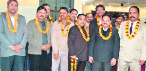 Arvind Pandey, SDM, with newly elected office-bearers of the Teshil Bar Association at Arya Nagar in Haridwar on Friday. 