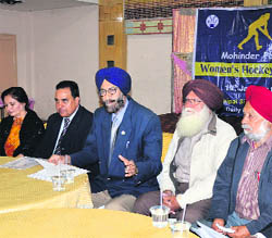 Members of the MPS Grewal Hockey Tournament Committee at a press conference in Ludhiana on Friday. 