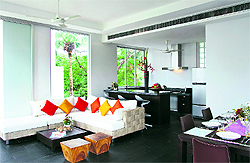 White is the most favoured hue to achieve a contemporary look. Vibrant accessories can perk up the decor