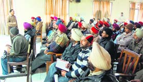 Police personnel take part in a training programme at Red Cross Bhawan in Amritsar on Saturday