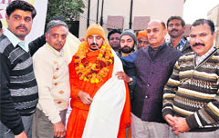 Swami Poornanand Saraswati with his disciples in Haridwar on Saturday. A Tribune photograph