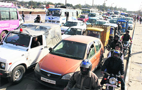 A traffic jam on the Tawi bridge in Jammu on Saturday. 