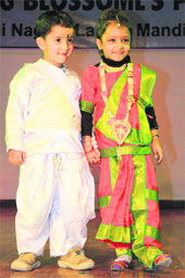 Children take part in a fashion show during the annual day function at Spring Blossom School in Jammu on Saturday.