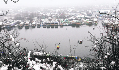 The world famous Dal Lake covered with snow in Srinagar on Saturday.