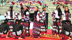 Youth perform the bamboo dance of Mizoram at the inauguration of the International Tourism Mart in Guwahati on Saturday. A Tribune photograph