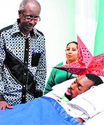 Yannick Nihangaza with his father at Columbia Asia Hospital in Patiala on Saturday