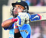 Virat Kohli plays a pull during his unbeaten knock of 77 which helped India crush England in the third One-day International in Ranchi on Saturday.  pti 