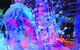 Visitors walk around at the Ice Sculpture Festival in Bruges, Belgium.