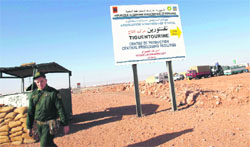 An Algerian soldier at a checkpoint near the Tiguentourine gas plant where militants have been holding hostages on Saturday. REUTERS