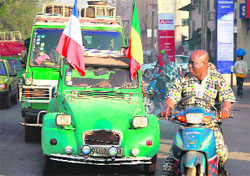 A car displaying French and Malian flags on a road in Bamako on Saturday. Reuters
